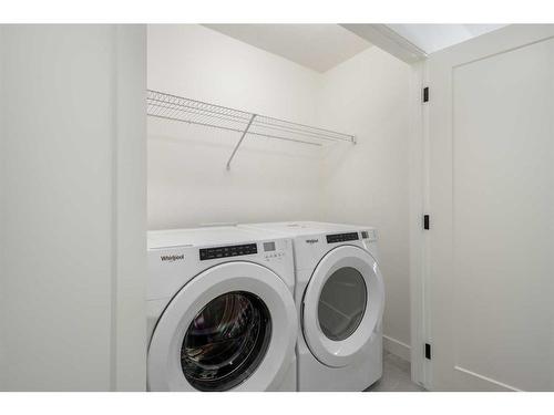 233 Spring Creek Circle Sw, Calgary, AB - Indoor Photo Showing Laundry Room