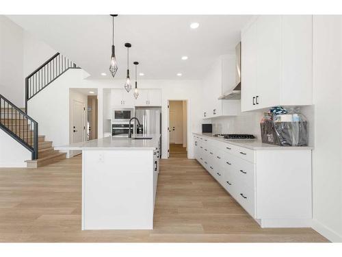 233 Spring Creek Circle Sw, Calgary, AB - Indoor Photo Showing Kitchen With Upgraded Kitchen