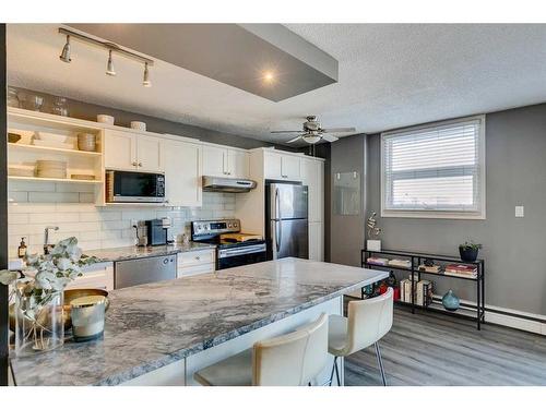 302-1027 Cameron Avenue Sw, Calgary, AB - Indoor Photo Showing Kitchen With Stainless Steel Kitchen With Upgraded Kitchen