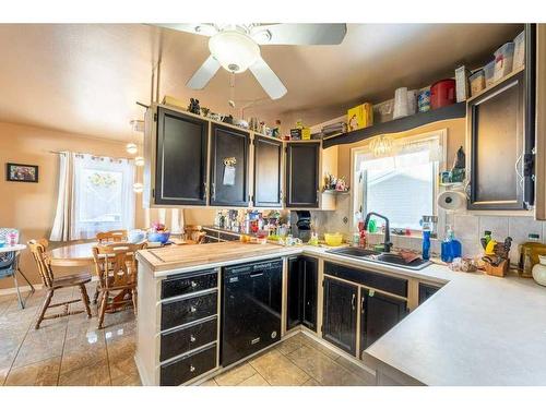 1101 40 Street Se, Calgary, AB - Indoor Photo Showing Kitchen With Double Sink