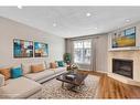 1801B 41 Street Nw, Calgary, AB  - Indoor Photo Showing Living Room With Fireplace 