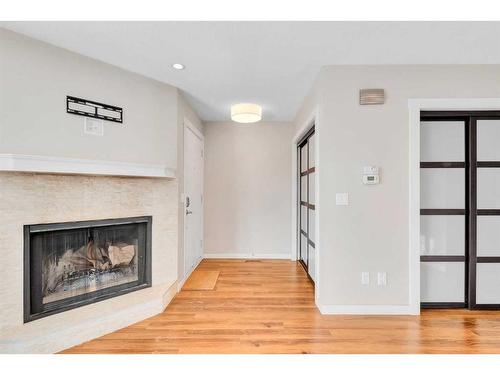 1801B 41 Street Nw, Calgary, AB - Indoor Photo Showing Living Room With Fireplace