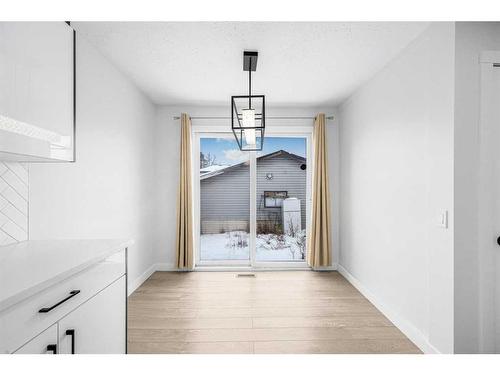 208 Falconridge Crescent Ne, Calgary, AB - Indoor Photo Showing Other Room