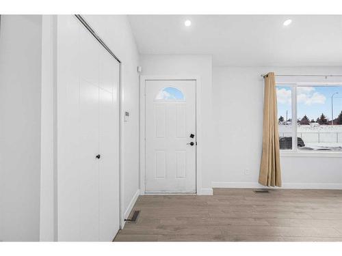 208 Falconridge Crescent Ne, Calgary, AB - Indoor Photo Showing Other Room