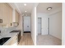 110-370 Dieppe Drive Sw, Calgary, AB  - Indoor Photo Showing Kitchen With Upgraded Kitchen 