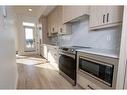 110-370 Dieppe Drive Sw, Calgary, AB  - Indoor Photo Showing Kitchen 