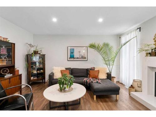 432 Lynnover Way Se, Calgary, AB - Indoor Photo Showing Living Room With Fireplace