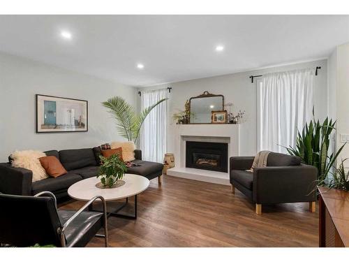 432 Lynnover Way Se, Calgary, AB - Indoor Photo Showing Living Room With Fireplace