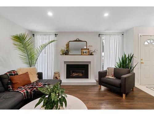 432 Lynnover Way Se, Calgary, AB - Indoor Photo Showing Living Room With Fireplace