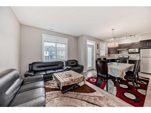 202-515 Redstone Walk Ne, Calgary, AB - Indoor Photo Showing Living Room