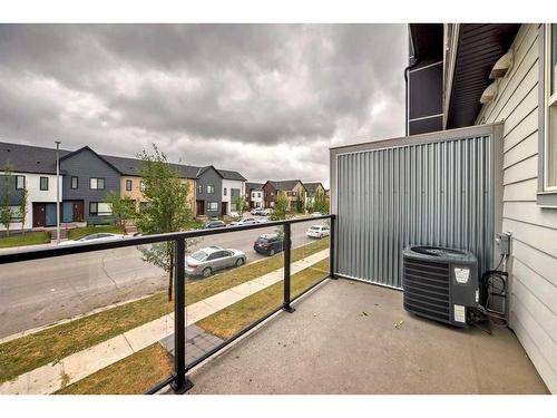 202-515 Redstone Walk Ne, Calgary, AB - Outdoor With Balcony With Exterior