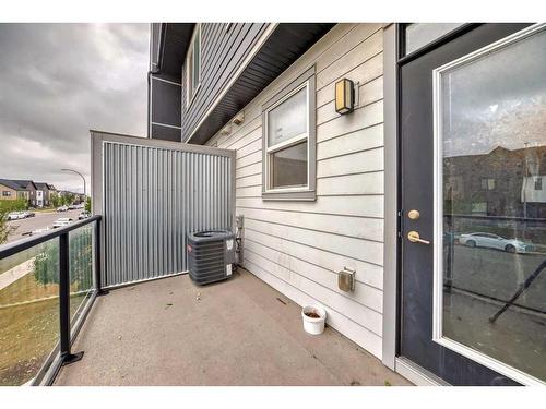 202-515 Redstone Walk Ne, Calgary, AB - Outdoor With Balcony With Exterior