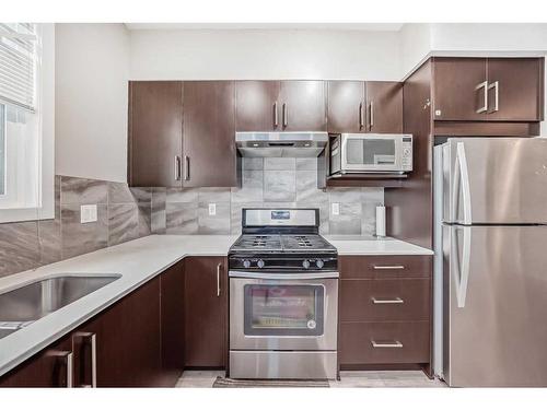 202-515 Redstone Walk Ne, Calgary, AB - Indoor Photo Showing Kitchen