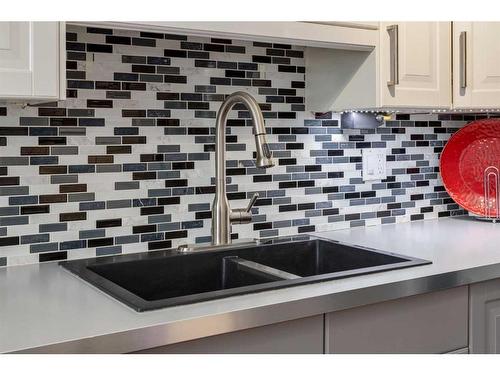 10-1739 24A Street Sw, Calgary, AB - Indoor Photo Showing Kitchen With Double Sink