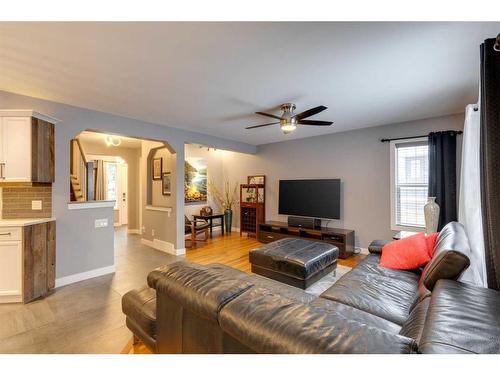 225 Cougar Ridge Drive Sw, Calgary, AB - Indoor Photo Showing Living Room