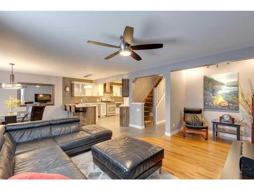 225 Cougar Ridge Drive Sw, Calgary, AB - Indoor Photo Showing Living Room