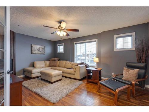 225 Cougar Ridge Drive Sw, Calgary, AB - Indoor Photo Showing Living Room