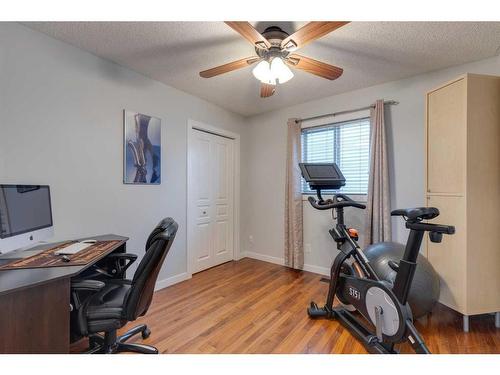 225 Cougar Ridge Drive Sw, Calgary, AB - Indoor Photo Showing Gym Room