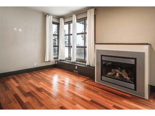 3524 8 Avenue Nw, Calgary, AB - Indoor Photo Showing Living Room With Fireplace