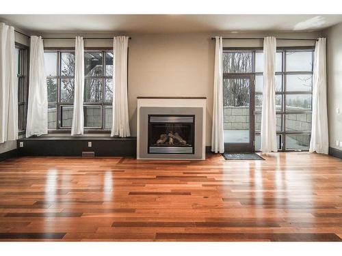 3524 8 Avenue Nw, Calgary, AB - Indoor Photo Showing Living Room With Fireplace