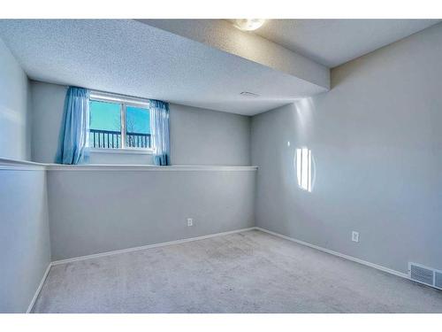 71 Mt Aberdeen Link Se, Calgary, AB - Indoor Photo Showing Other Room