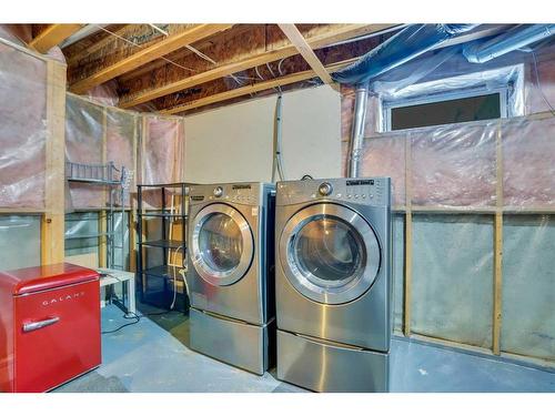 71 Mt Aberdeen Link Se, Calgary, AB - Indoor Photo Showing Laundry Room