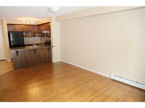 1117-130 Panatella Street Nw, Calgary, AB - Indoor Photo Showing Kitchen