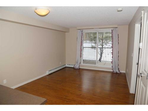 1117-130 Panatella Street Nw, Calgary, AB - Indoor Photo Showing Other Room