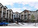 1117-130 Panatella Street Nw, Calgary, AB  - Outdoor With Balcony With Facade 