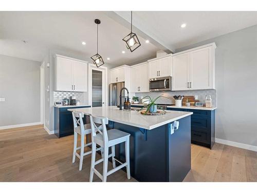 42 Waterford Road, Chestermere, AB - Indoor Photo Showing Kitchen With Upgraded Kitchen