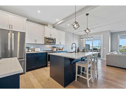 42 Waterford Road, Chestermere, AB - Indoor Photo Showing Kitchen With Upgraded Kitchen