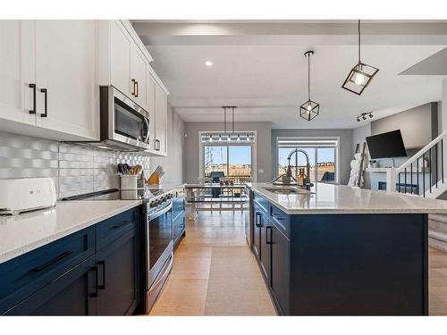 42 Waterford Road, Chestermere, AB - Indoor Photo Showing Kitchen With Upgraded Kitchen