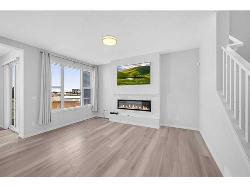 94 Belmont Crescent Sw, Calgary, AB - Indoor Photo Showing Living Room With Fireplace