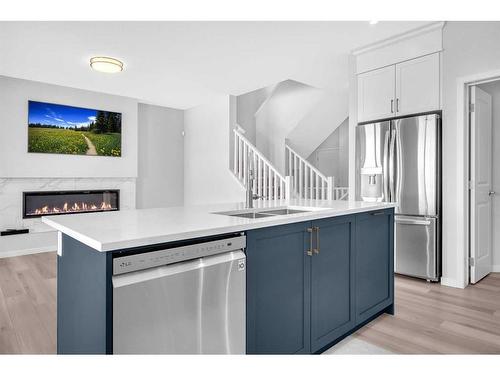 94 Belmont Crescent Sw, Calgary, AB - Indoor Photo Showing Kitchen With Double Sink