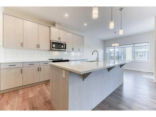 81 Legacy Reach Crescent Se, Calgary, AB - Indoor Photo Showing Kitchen With Upgraded Kitchen