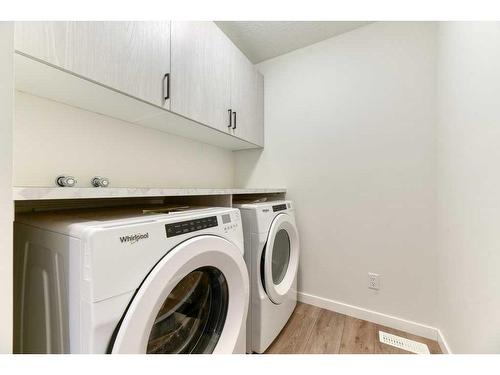 81 Legacy Reach Crescent Se, Calgary, AB - Indoor Photo Showing Laundry Room