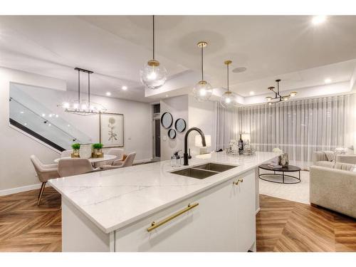 114-8505 Broadcast Avenue Sw, Calgary, AB - Indoor Photo Showing Kitchen With Double Sink With Upgraded Kitchen