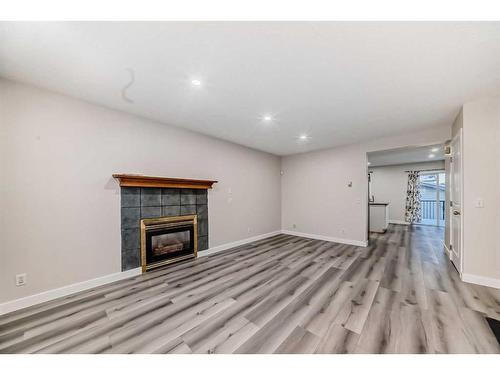 68 Martinbrook Link Ne, Calgary, AB - Indoor With Fireplace