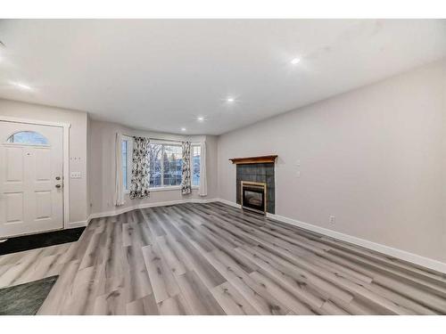 68 Martinbrook Link Ne, Calgary, AB - Indoor With Fireplace