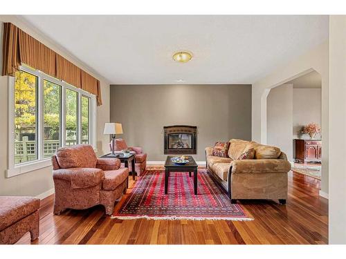 8220 9 Avenue Sw, Calgary, AB - Indoor Photo Showing Living Room With Fireplace