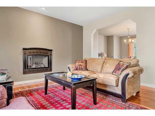 8220 9 Avenue Sw, Calgary, AB - Indoor Photo Showing Living Room With Fireplace