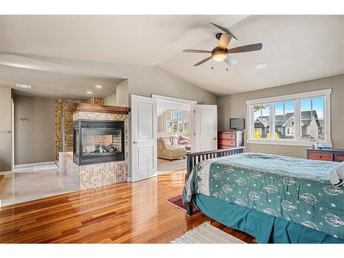 8220 9 Avenue Sw, Calgary, AB - Indoor Photo Showing Bedroom With Fireplace