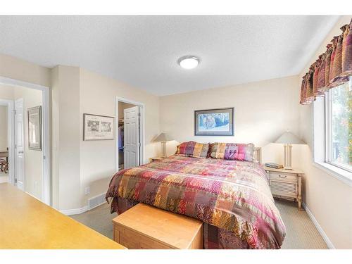 224 Copperfield Lane Se, Calgary, AB - Indoor Photo Showing Bedroom