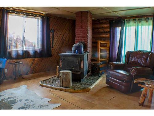 7063 584 Highway, Sundre, AB - Indoor Photo Showing Living Room