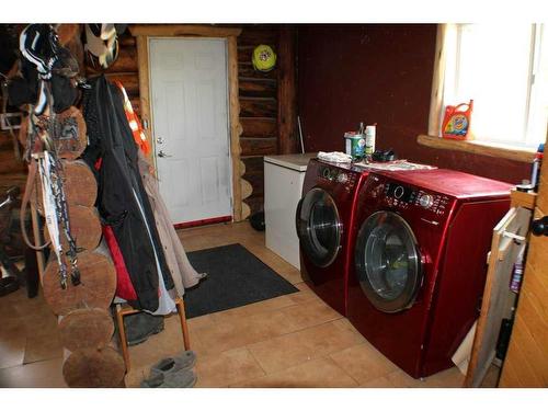 7063 584 Highway, Sundre, AB - Indoor Photo Showing Laundry Room