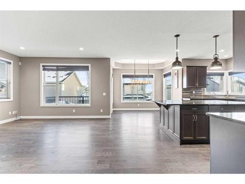 134 Rainbow Falls Blvd, Chestermere, AB - Indoor Photo Showing Kitchen With Upgraded Kitchen