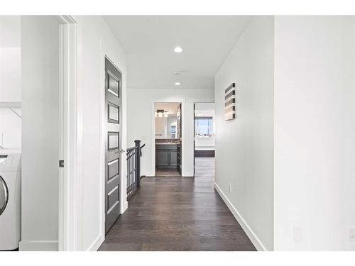 134 Rainbow Falls Blvd, Chestermere, AB - Indoor Photo Showing Laundry Room