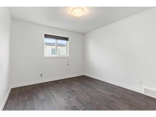 134 Rainbow Falls Blvd, Chestermere, AB - Indoor Photo Showing Other Room