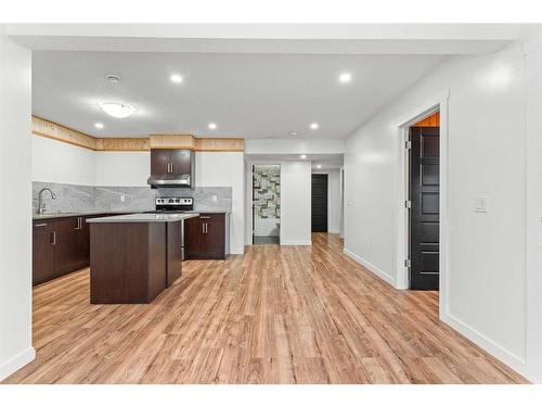 134 Rainbow Falls Blvd, Chestermere, AB - Indoor Photo Showing Kitchen