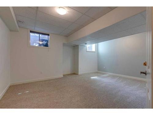 115-5555 Elbow Drive Sw, Calgary, AB - Indoor Photo Showing Basement